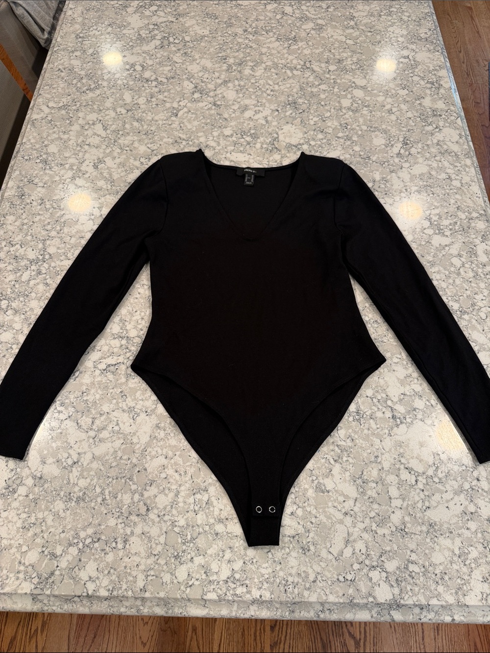 Black Long Sleeve V-Neck Bodysuit with shoulder pads XL never worn